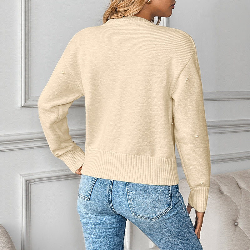 Pearl decoration heart button solid color sweater jacket for women - worn by model